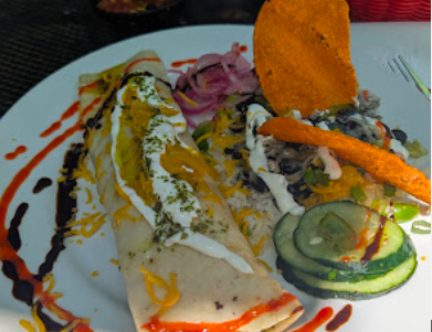 Rolando's Restaurante signature dishes Susu's Enchiladas
Popeye's Burrito
Tilapia Tacos